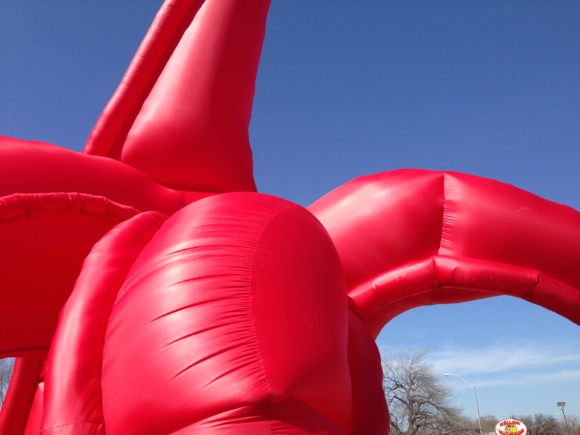 The Eagle Has Landed, 2013–2014 — HOMECOMING! Committee project with artist Bradly Brown. Large red inflatable sculpture outdoors