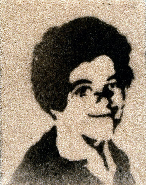 15,540 Miles, 2002 — artwork by artist Bradly Brown. Close-up of a cyanotype yearbook portrait on carpet